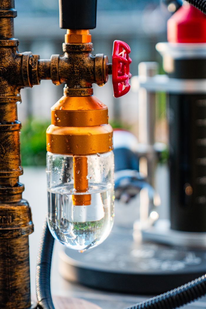 Crafting Captivating Headlines: Your awesome post title goes here Close-up of an industrial pipe with water gauge and valve, ideal for engineering and industry themes.
